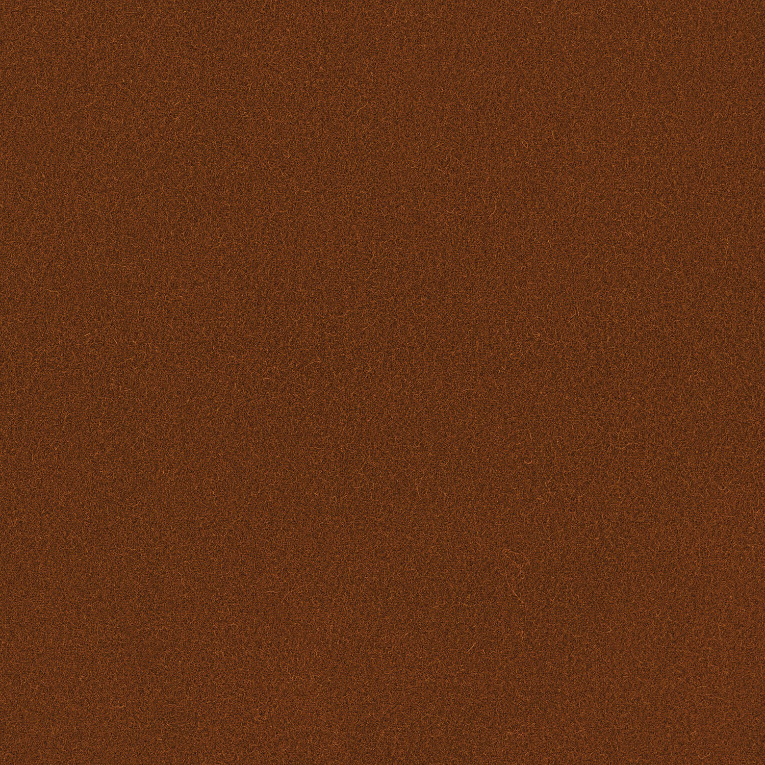 Close-up of warm burnt toffee brown wool with a fine mottled plain weave