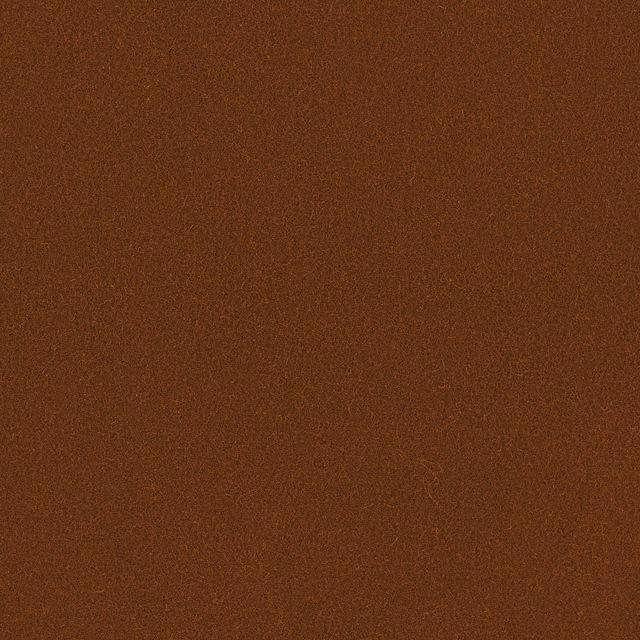 Close-up of warm burnt toffee brown wool with a fine mottled plain weave