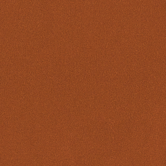 Ember terracotta Romney wool with a fine, softly mottled plain weave