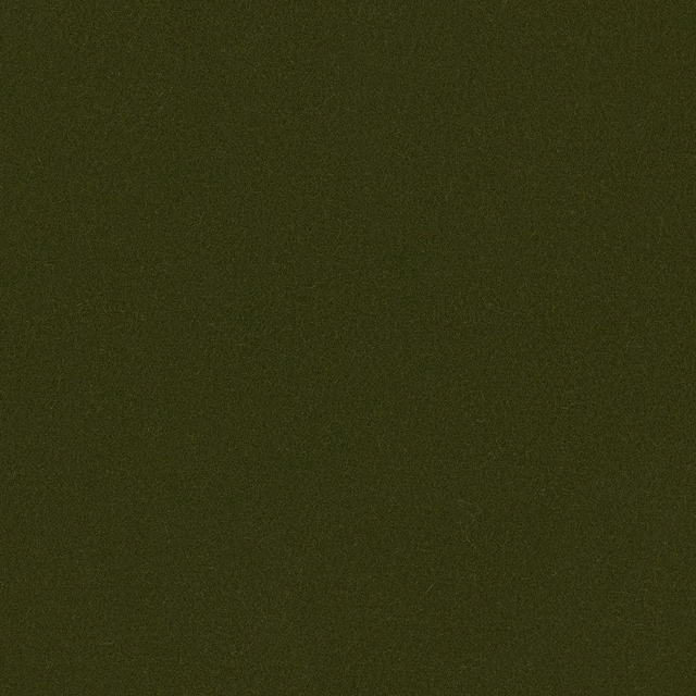 Close-up of deep moss green Romney wool with a dense matte plain weave