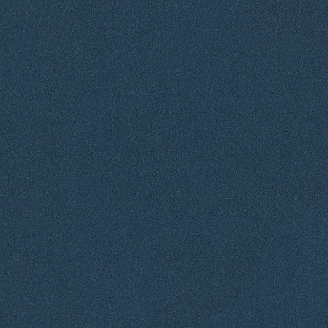 Deep teal Romney wool with a fine, softly mottled plain weave texture
