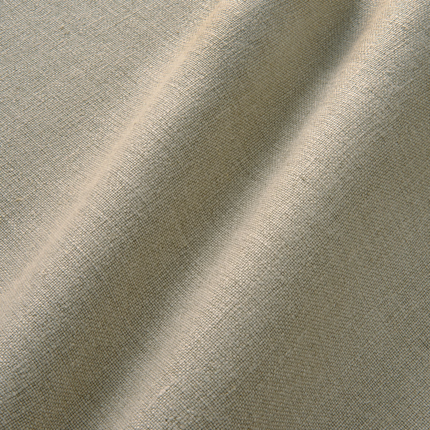 Warm taupe linen weave showing fine crosshatch texture and softly shaded folds