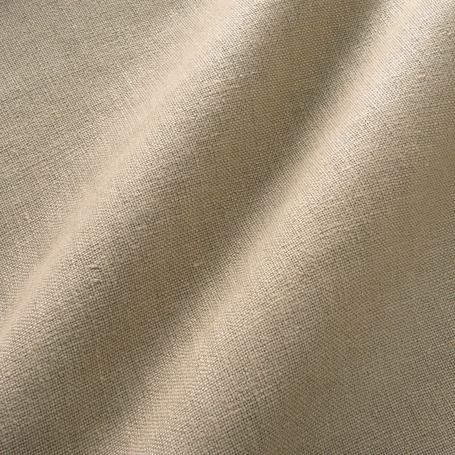 Warm sable taupe plain-weave linen textile with softly shaded folds