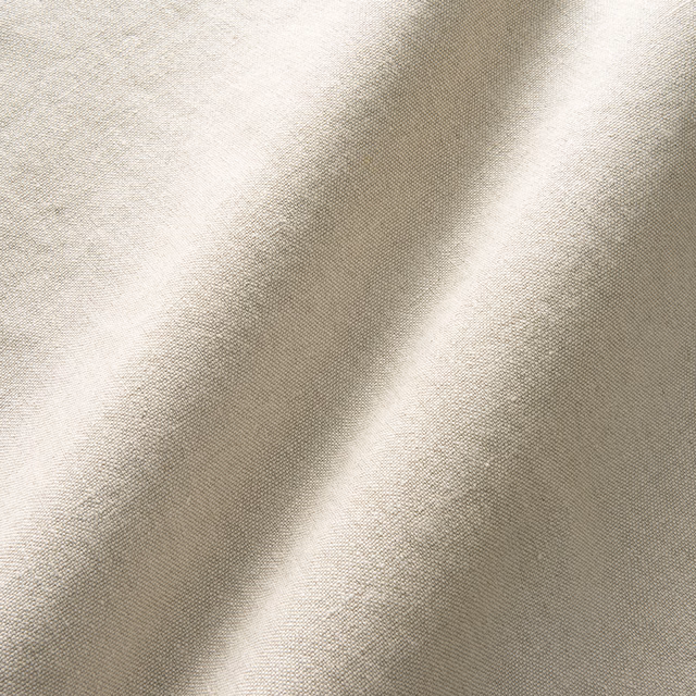 Close-up of pearl-grey Serrano fabric showing a fine woven crosshatch texture