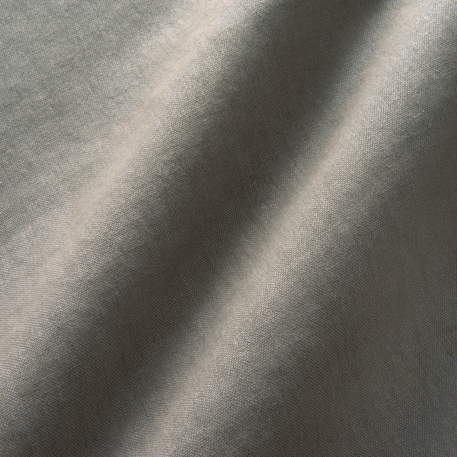 Cool charcoal-grey woven fabric with silvery highlights and subtle diagonal tonal movement