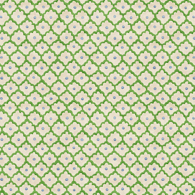 Mint green scallop pattern on cream fabric with tiny blue dot centres