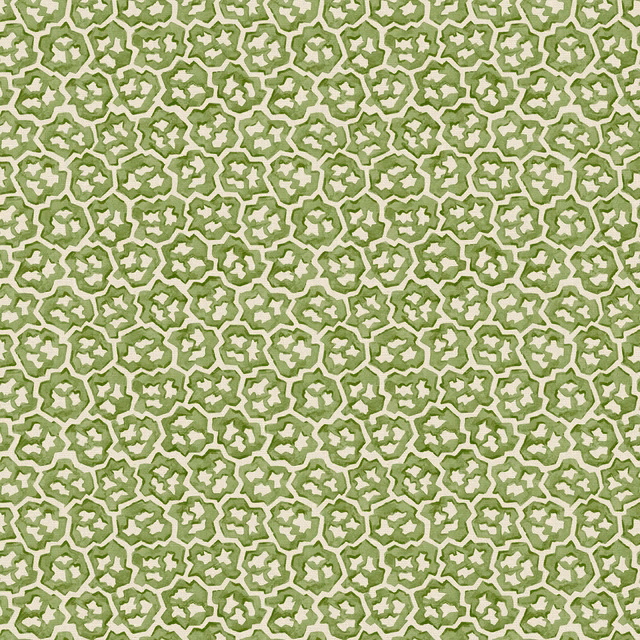 Gooseberry-green fabric with dense cream outlined star and quatrefoil motifs
