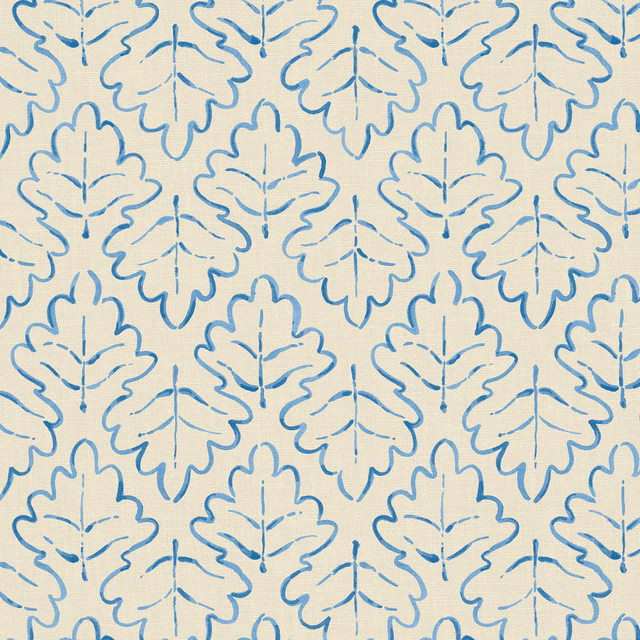 Cool blue outlined leaf motifs on a pale cream linen ground