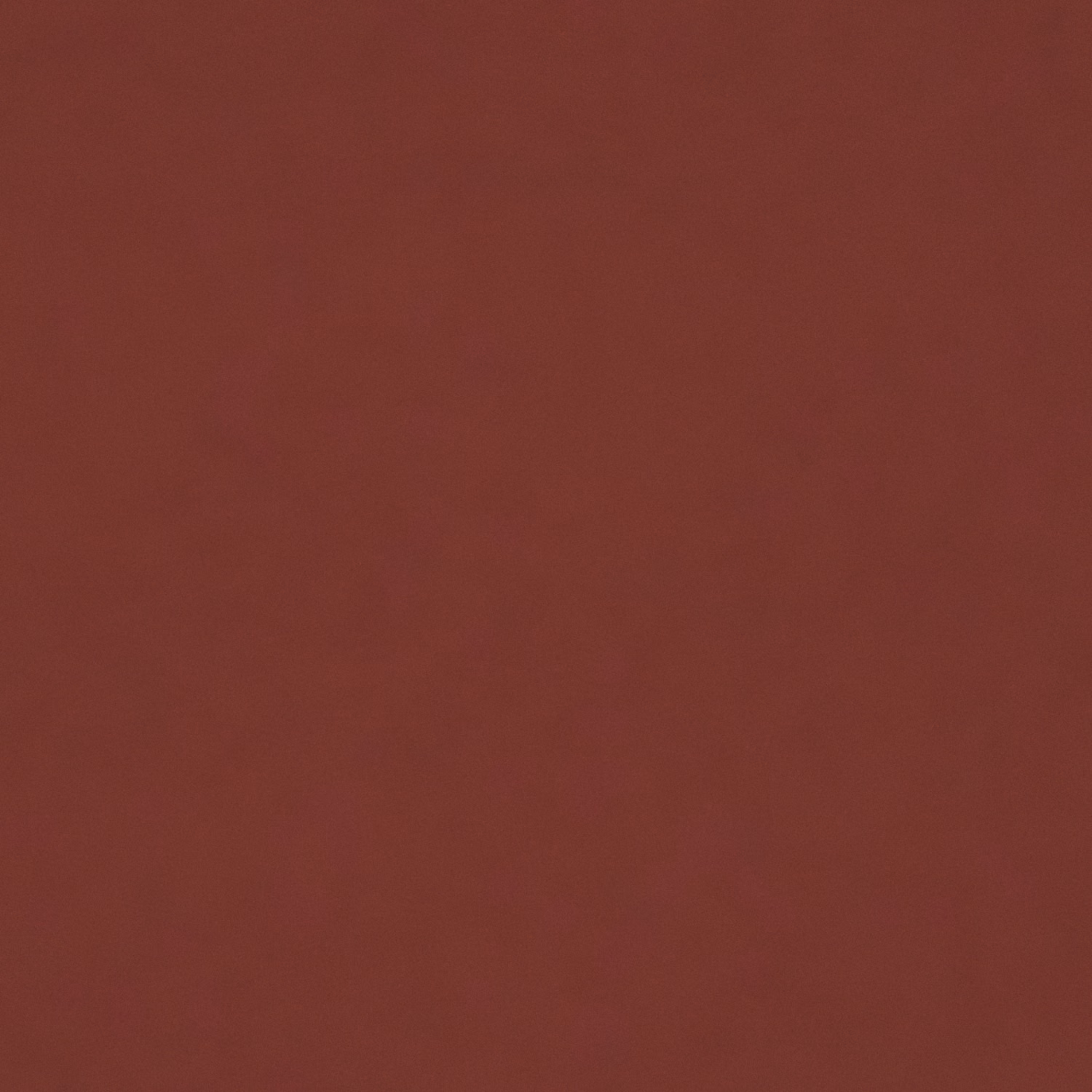 Deep rhubarb-red velvet showing a soft, plain nap and subtle tonal shading