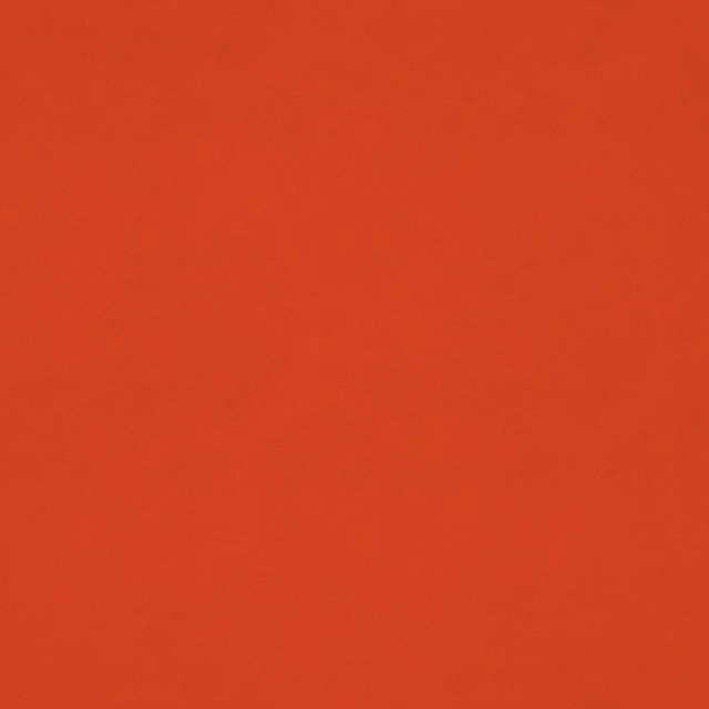 Warm tomato-red plain velvet swatch with a soft, subtly shaded pile