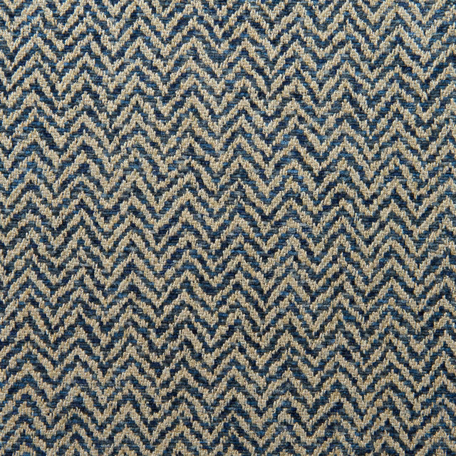 Navy and oatmeal herringbone zigzags in a dense, textured woven close-up