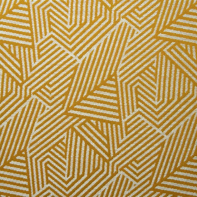 Mustard gold and cream woven fabric with angular chevrons and directional stripes