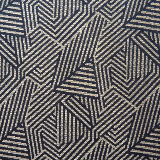 Ink navy and cream woven fabric with interlocking angular stripe motifs