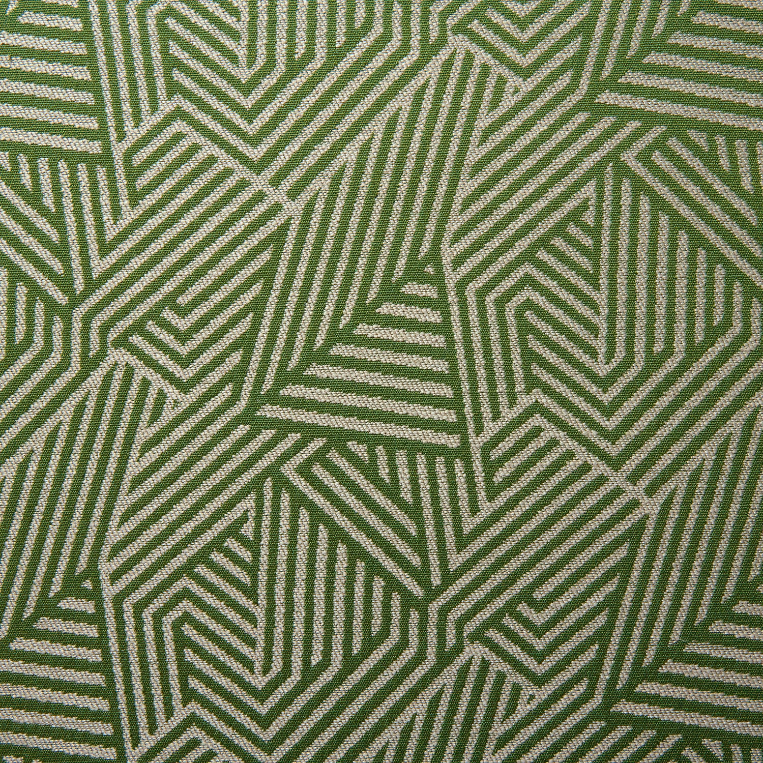 Spring-green woven fabric with cream angular chevrons and geometric linework