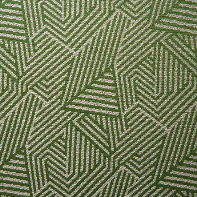 Spring-green woven fabric with cream angular chevrons and geometric linework