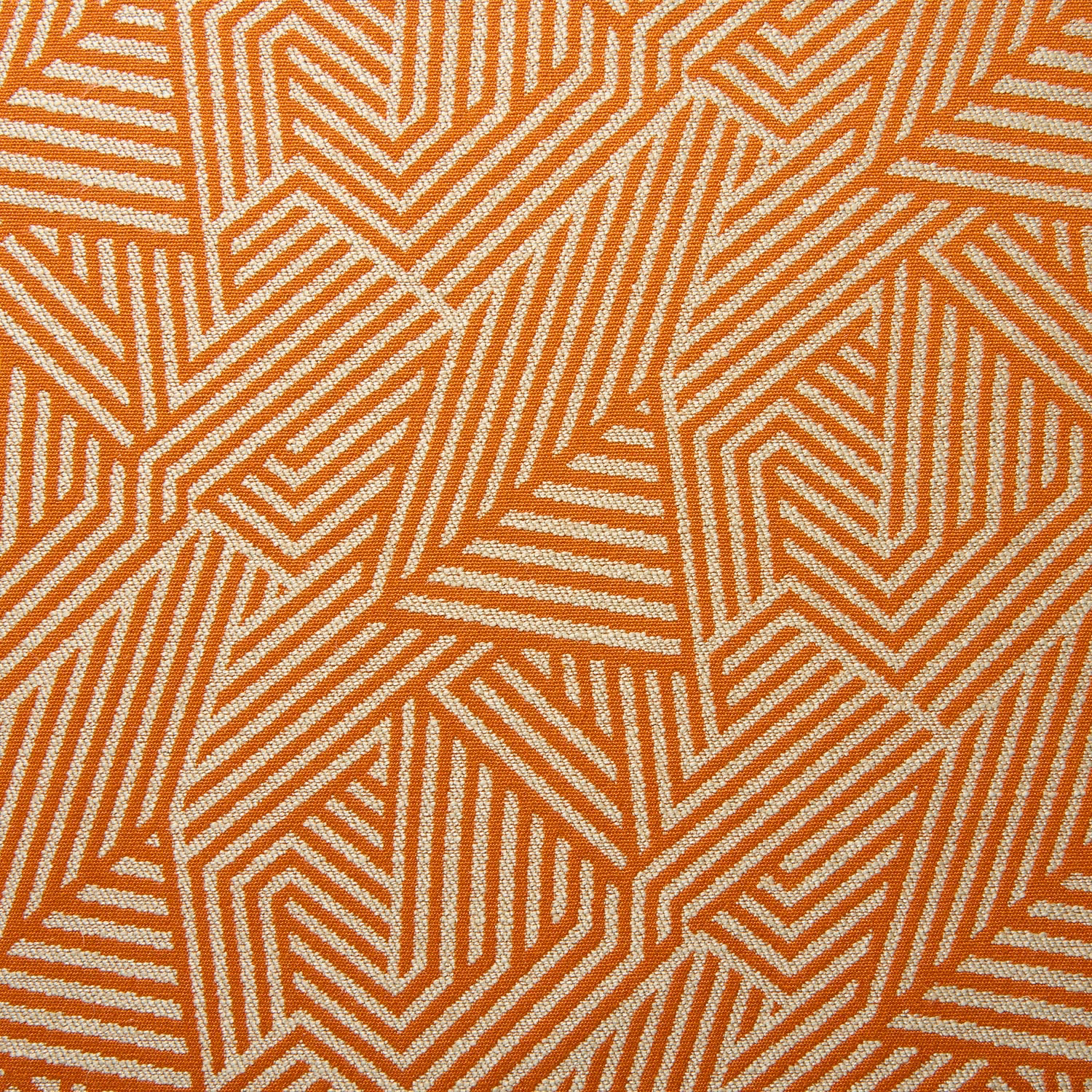 Tangerine and ivory woven fabric with interlocking angular chevrons and ribbed lines