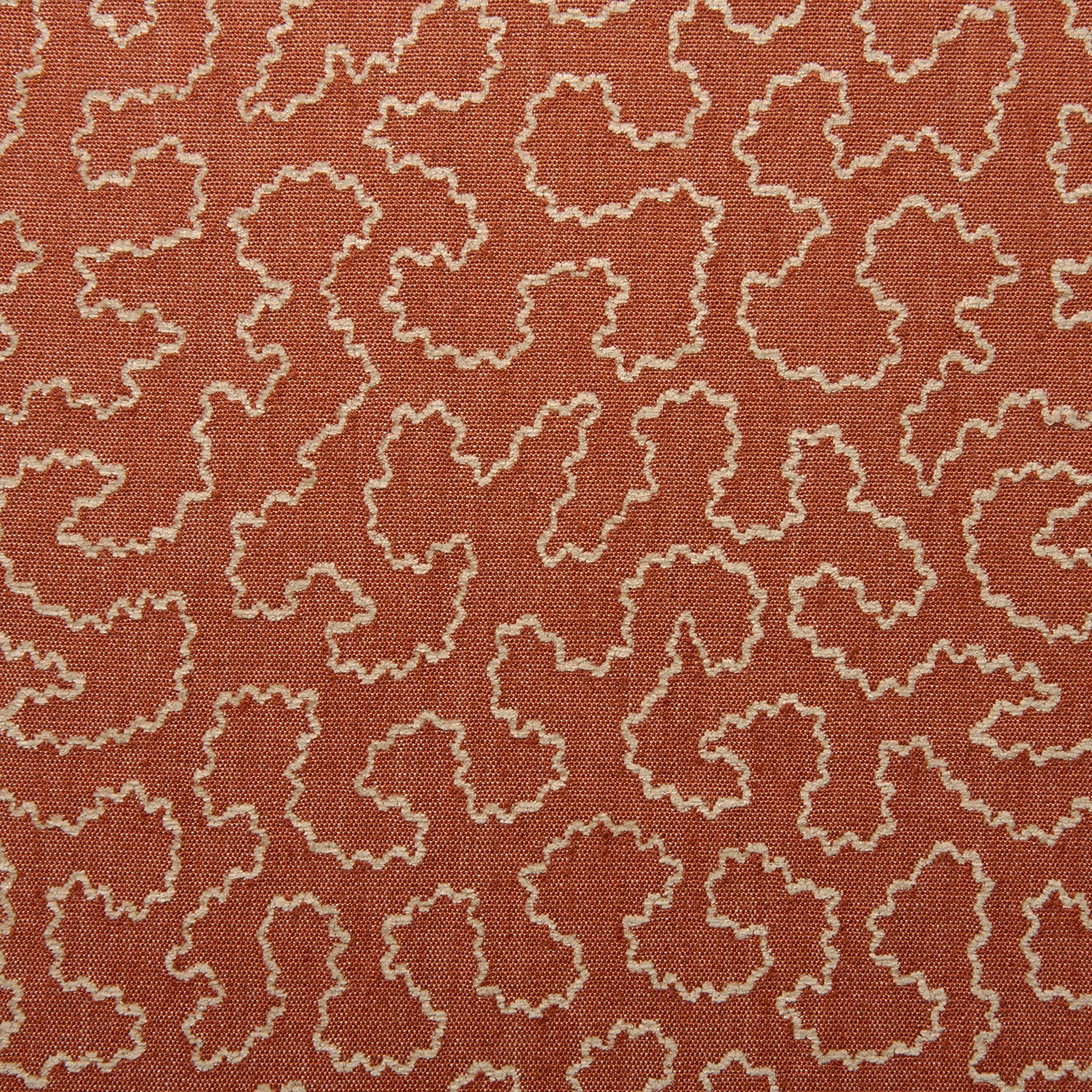 Carmine red woven fabric with small cream-edged irregular abstract motifs