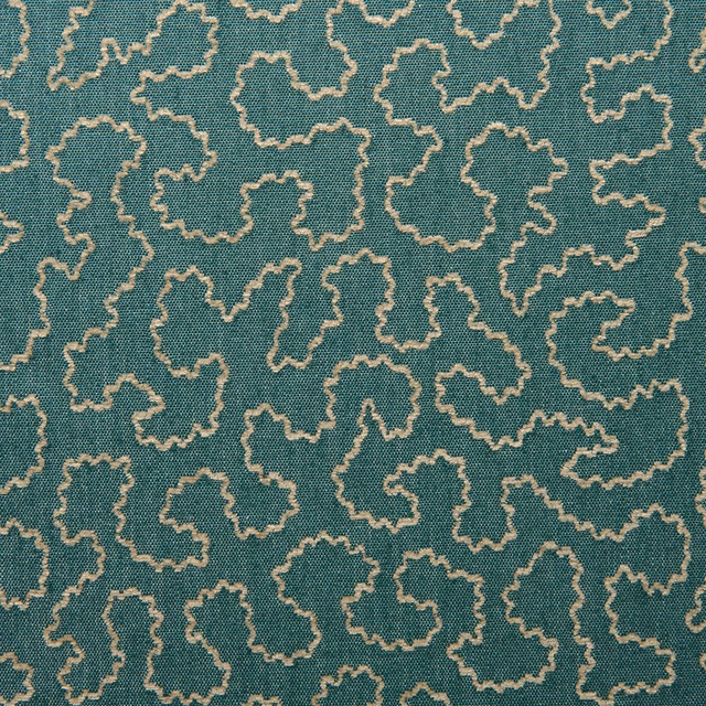 Cyan teal woven fabric with beige irregular outlined geometric motifs
