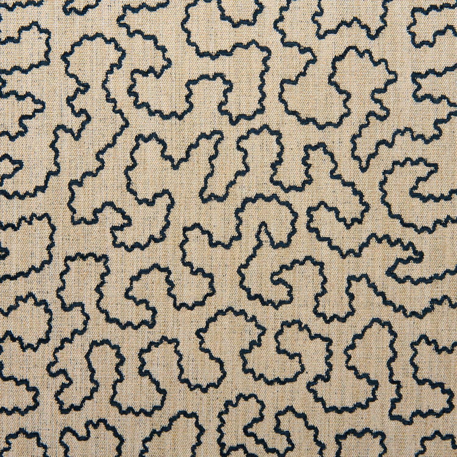Warm greige woven textile with small charcoal wiggled outline motifs in an abstract pattern