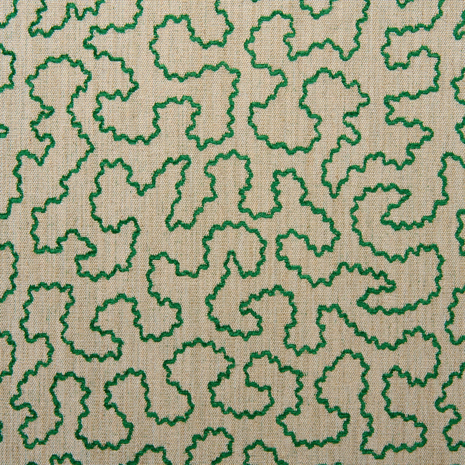 Emerald green squiggle outlines across a finely woven beige fabric