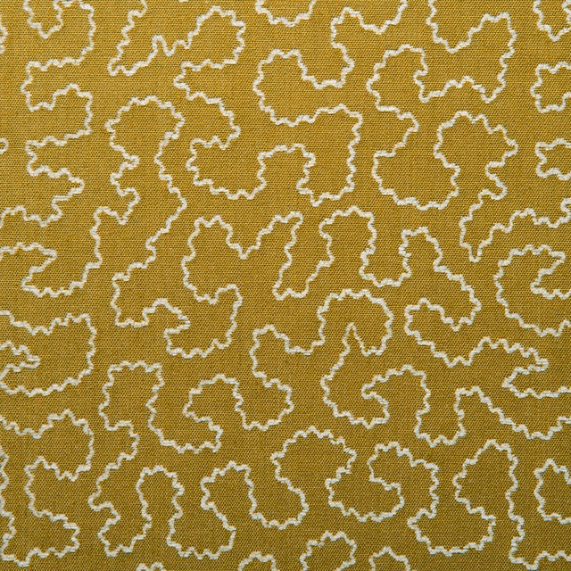Ochre-gold woven fabric with cream-white irregular squiggle outlines