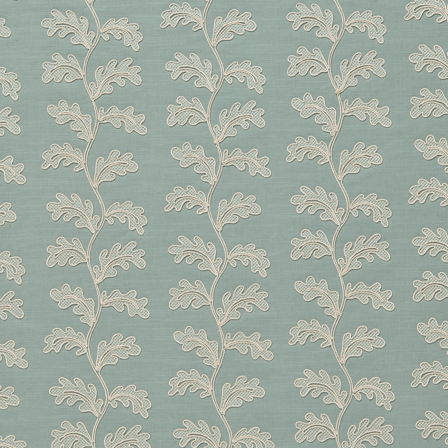 Aqua-green woven fabric with trailing cream leaf motifs in vertical rows