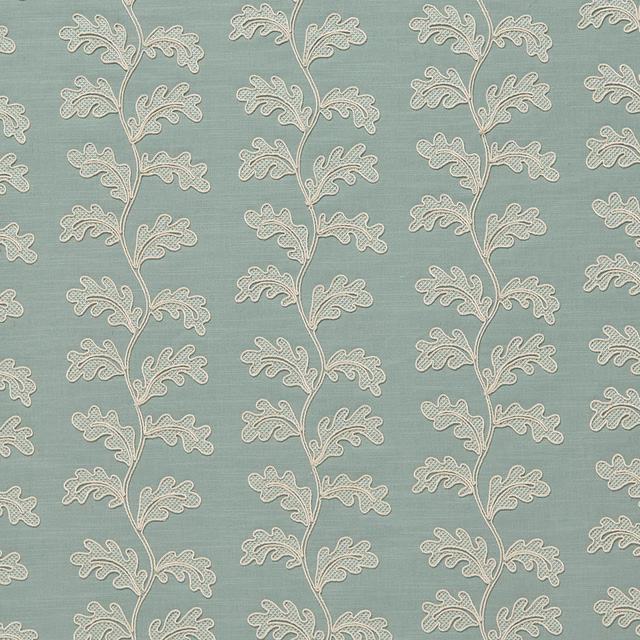 Aqua-green woven fabric with trailing cream leaf motifs in vertical rows