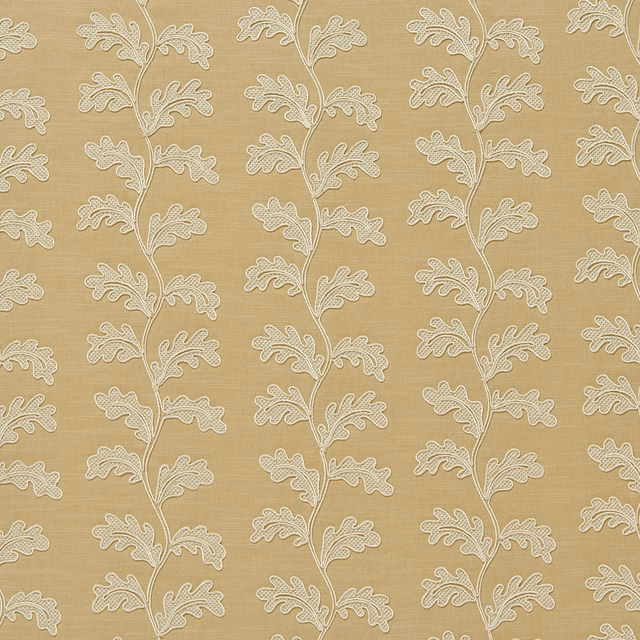 Stitched leaf trail pattern on warm straw beige fabric with cream embroidery