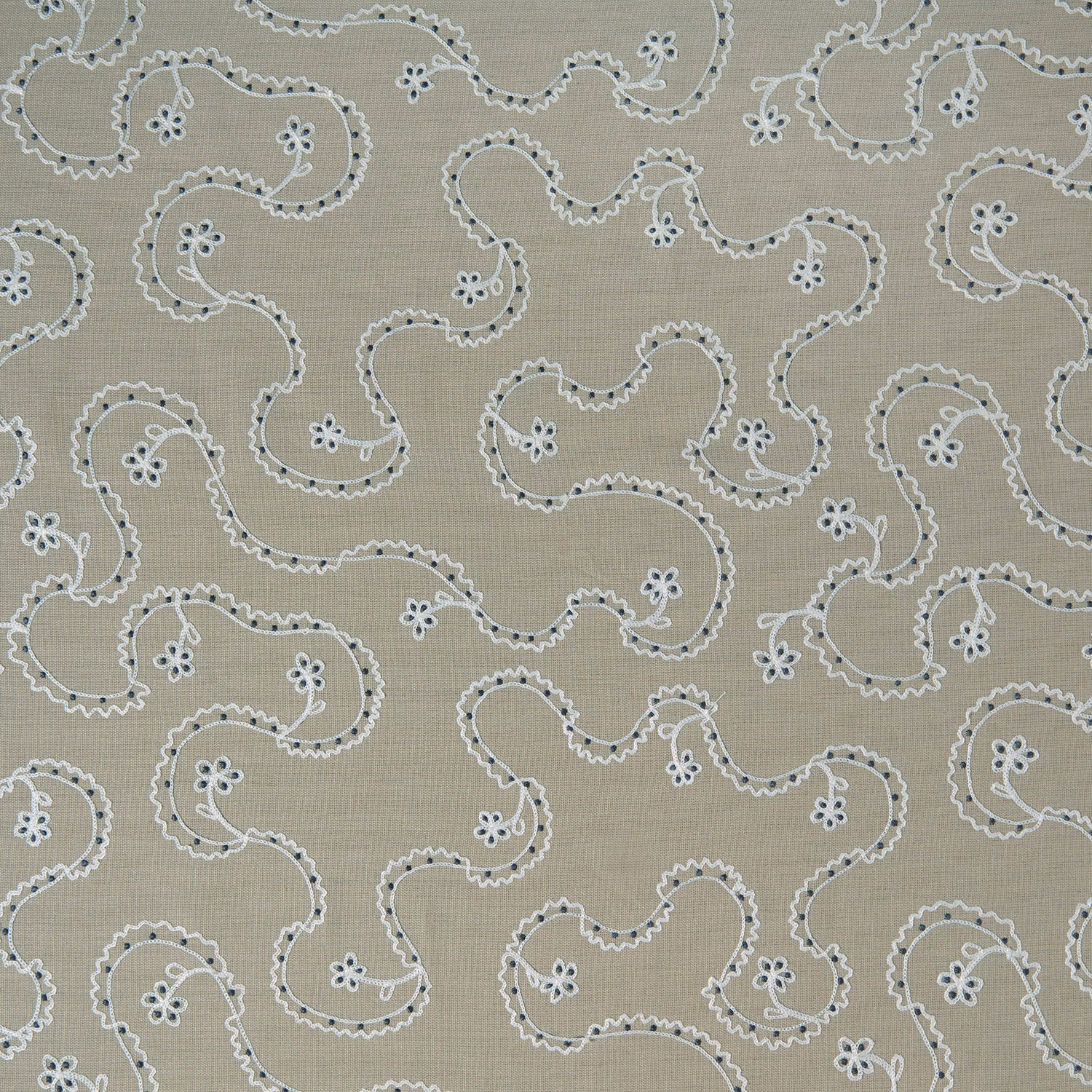 Taupe beige patterned cushion fabric with white trailing floral scrolls