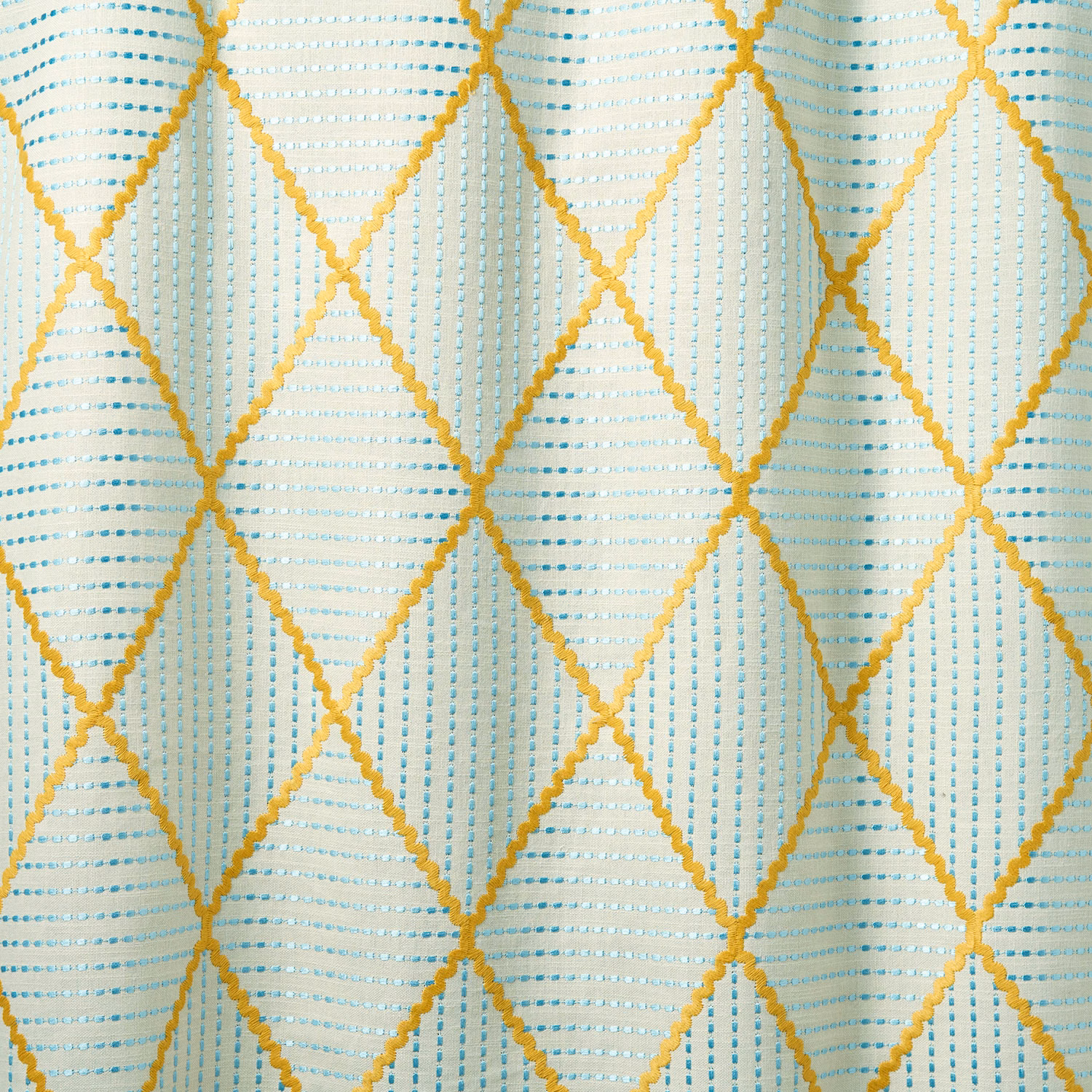 Cream fabric with gold diamond lattice and turquoise dash detailing