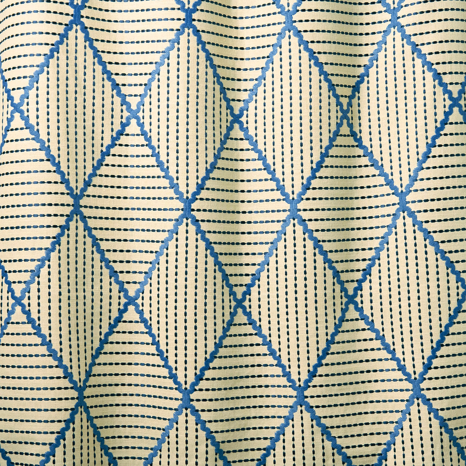Cream fabric with blue diamond lattice and fine dotted stripe texture