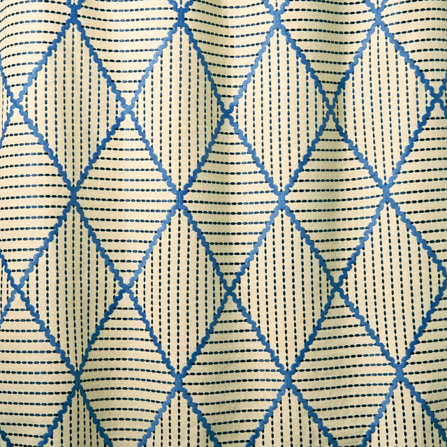 Cream fabric with blue diamond lattice and fine dotted stripe texture