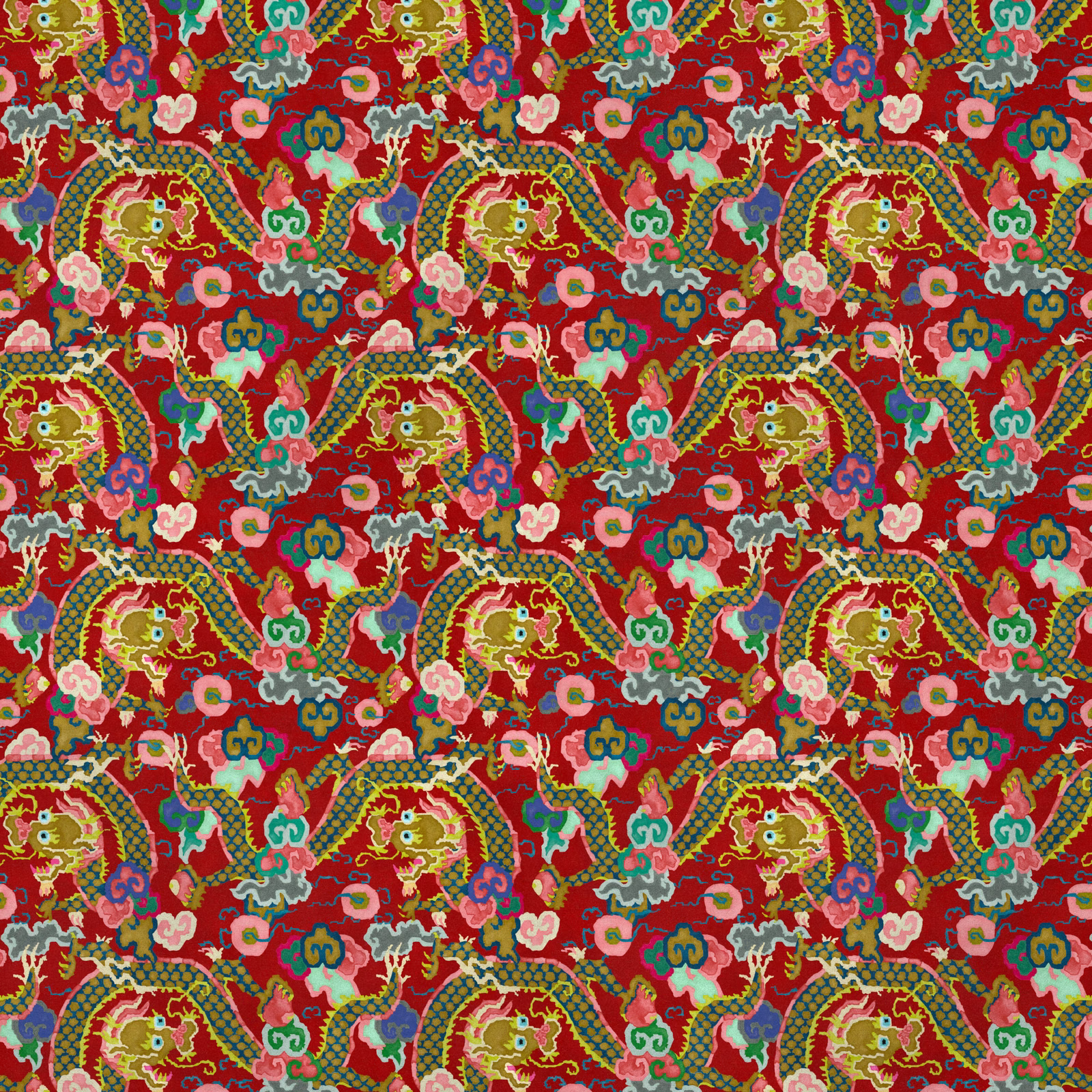 Lacquer-red velvet showing repeating dragons, flowers and turquoise, olive and pink details