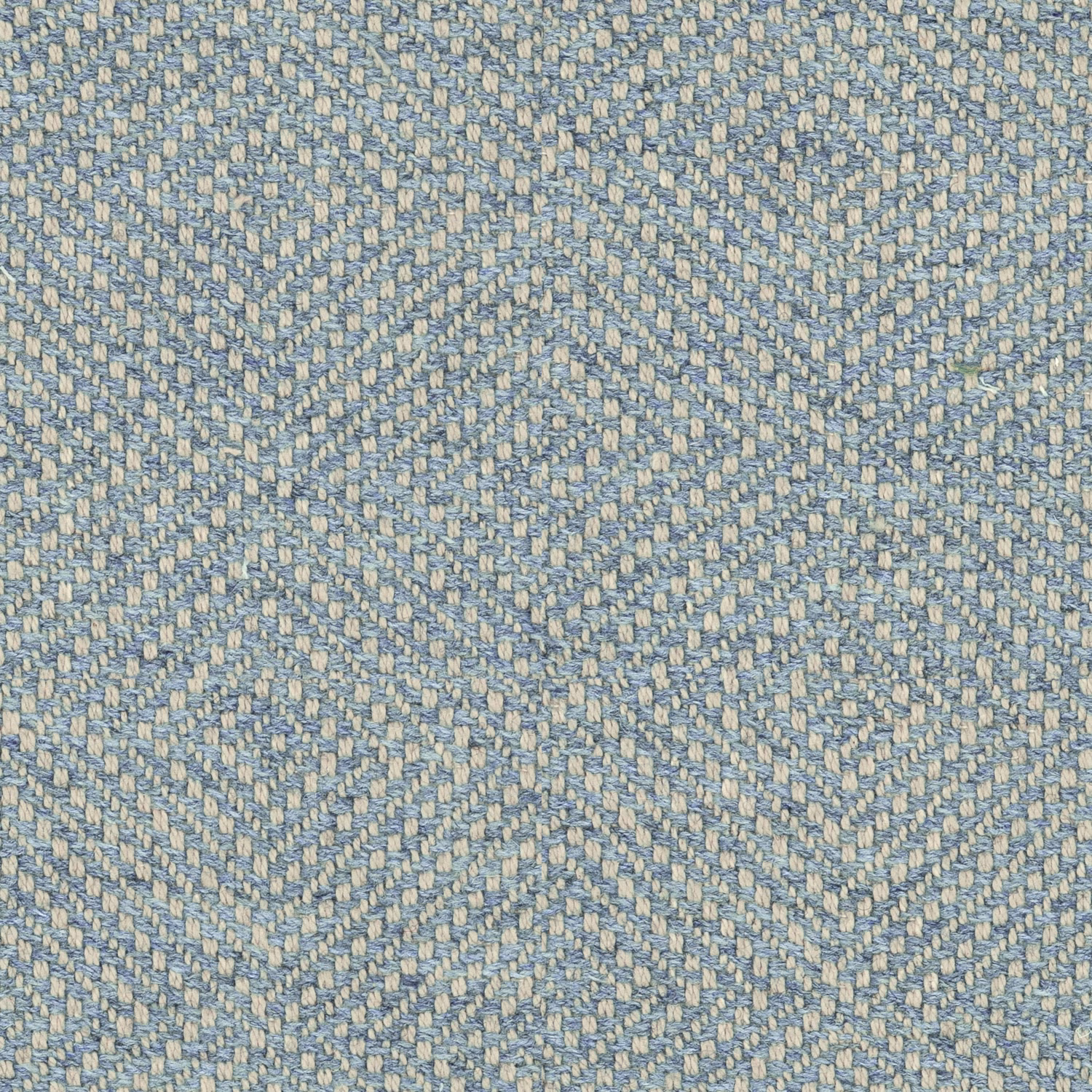Close view of Westray Denim’s blue, lilac and cream broken chevron weave