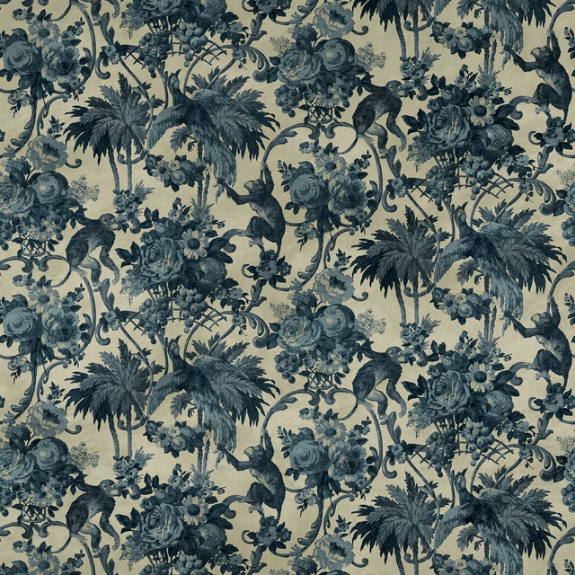 Muted old-blue fabric with monkeys, palms, fruit and dense dark botanical foliage