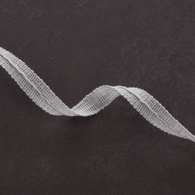 Charcoal fabric with a raised dove-grey wave ribbon and ridged texture