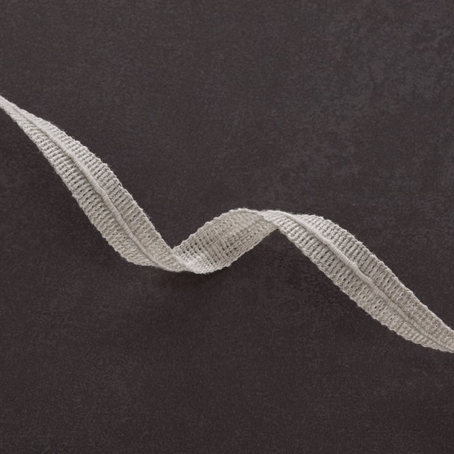 Charcoal fabric with a raised silver-grey winding branch-like motif