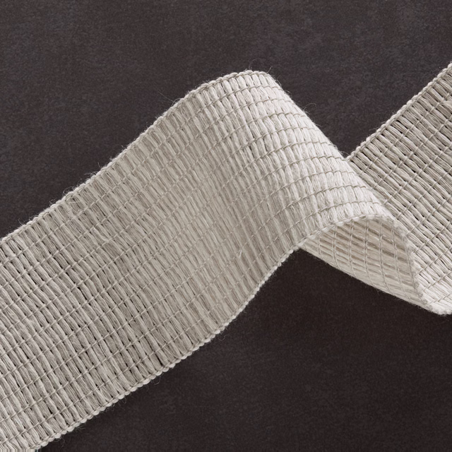 Pale silvery-grey woven fabric with raised ribs and an irregular grid texture