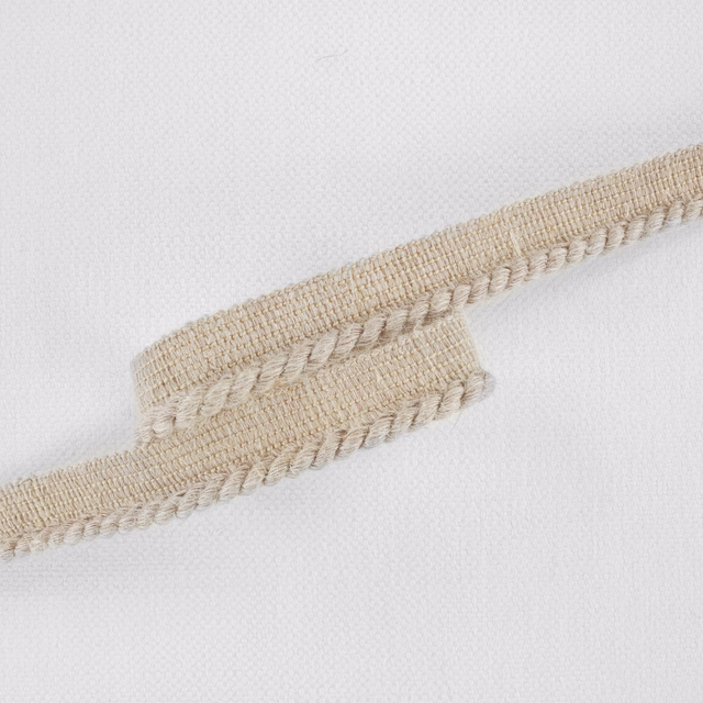 Warm natural beige woven tape with raised twisted braid edging