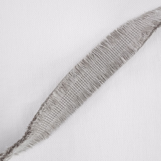 Cement-grey woven fabric with a raised feather-like diagonal motif