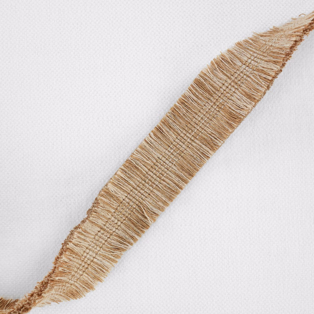 Warm moccasin beige fringed stripe crossing a softly textured ivory fabric ground