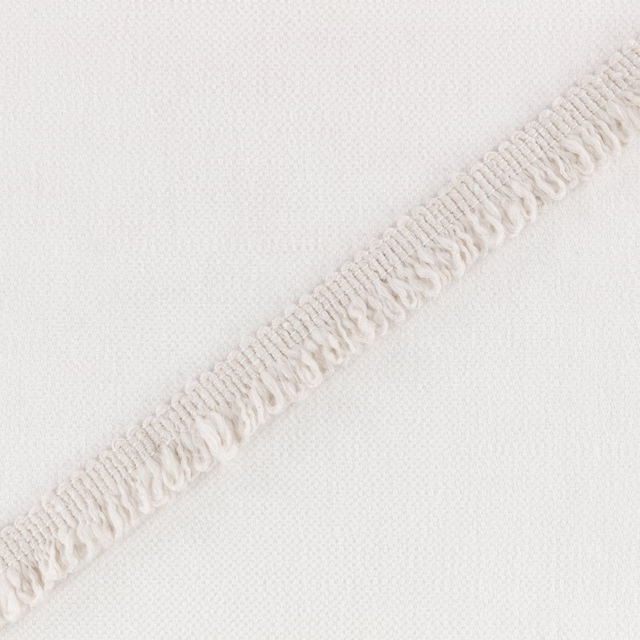 Ivory woven ground with a raised, looped diagonal stripe in close view