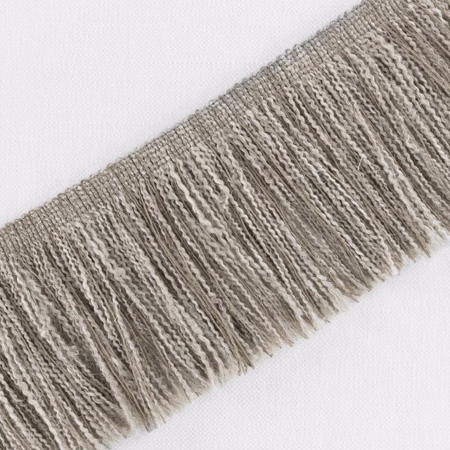 Cool cement taupe fabric with irregular raised ribs and a softly fringed edge