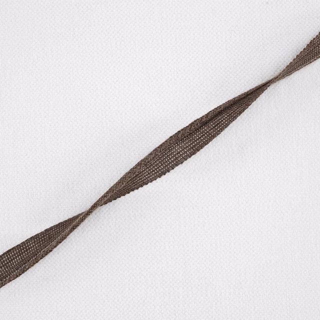 Pale woven fabric with a warm chestnut-brown tapered diagonal stripe