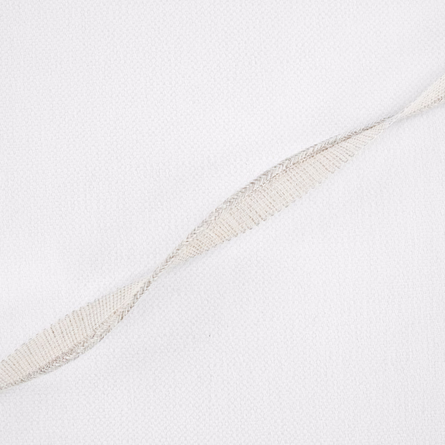 Pale ecru fine weave with a subtle beige feather-like motif running diagonally