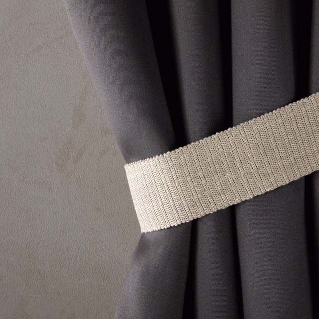 Warm ecru ribbed textile with compact woven diagonal texture