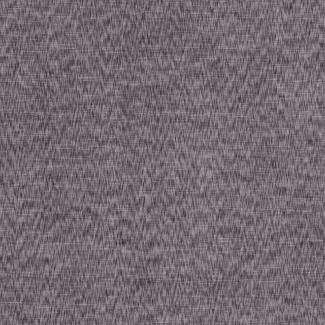 Close-up of muted amethyst-grey textile with a fine, irregular woven surface