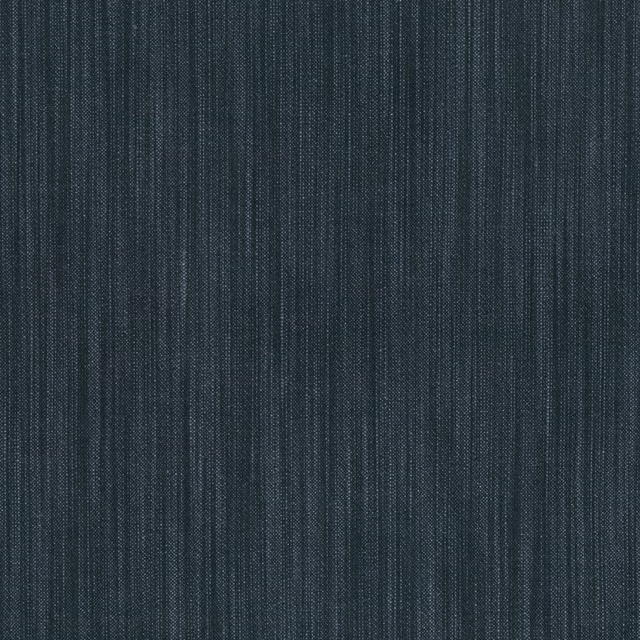 Close-up of dark indigo woven fabric with fine, irregular vertical striations