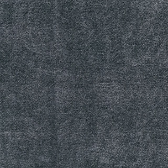 Dark indigo-blue textile with a softly mottled, cloudy woven texture