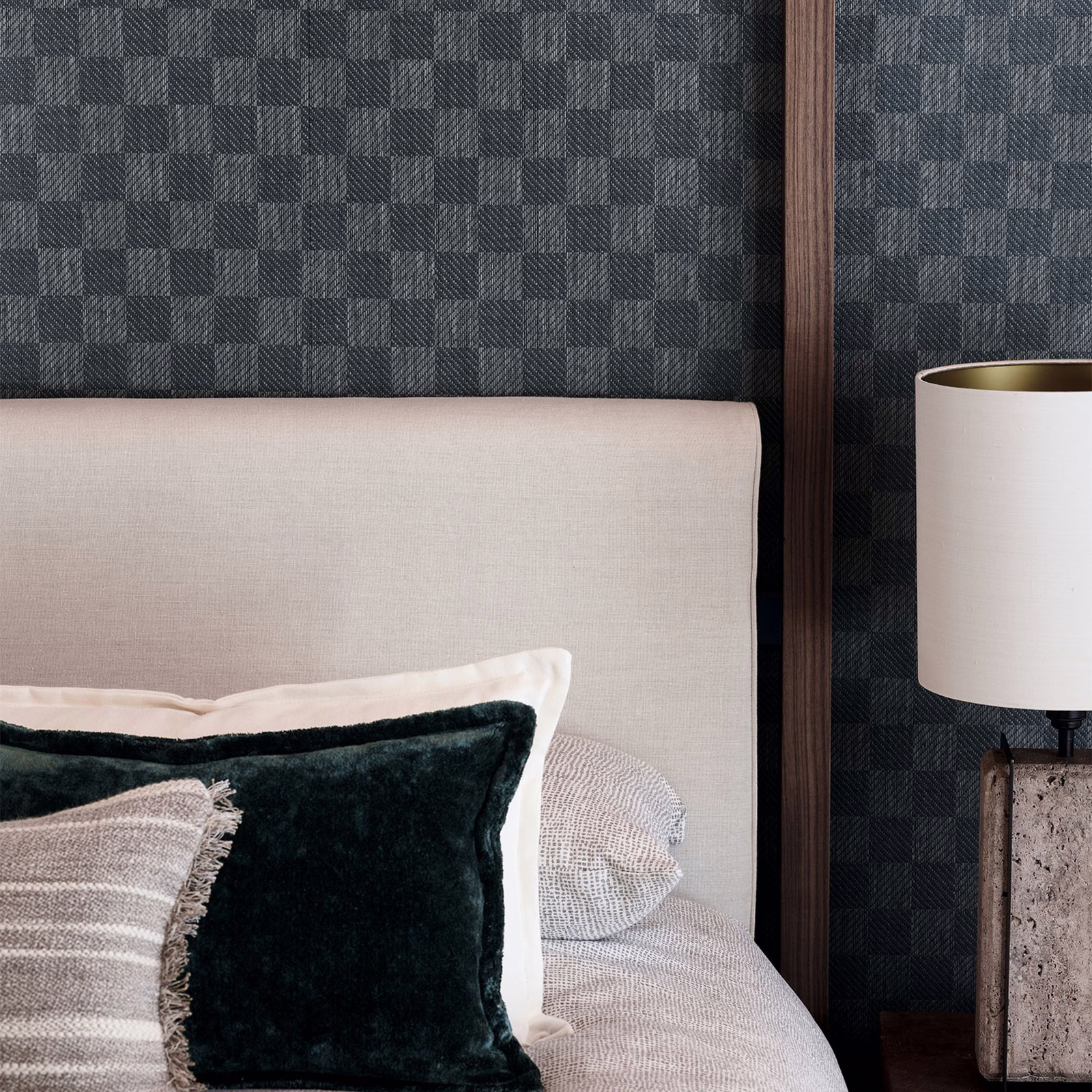 Dark charcoal-grey checked wallpaper with finely textured square blocks